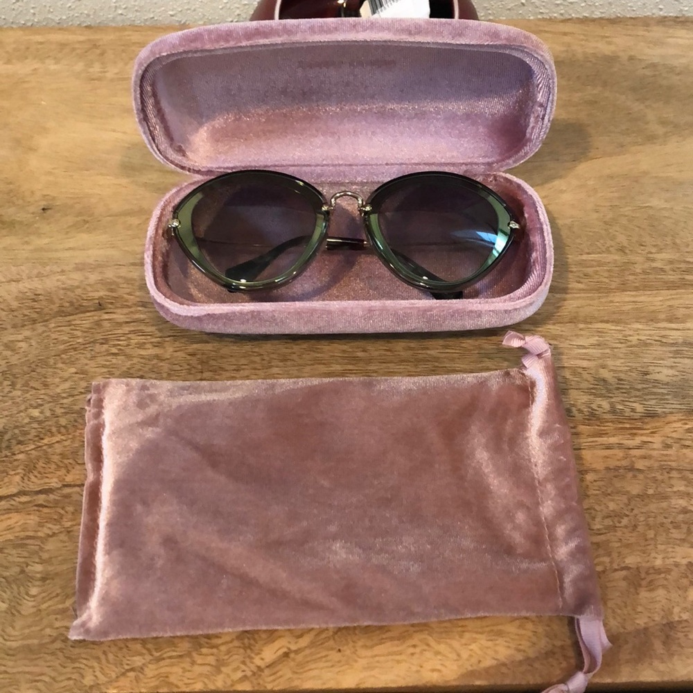 MIU MIU green cat eye sunglasses